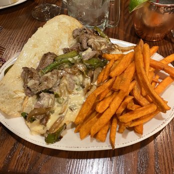 Rocky River Tap and Table - Rocky River Cheesesteak & sweet potato fries - Bars Near Me - Granger, Indiana