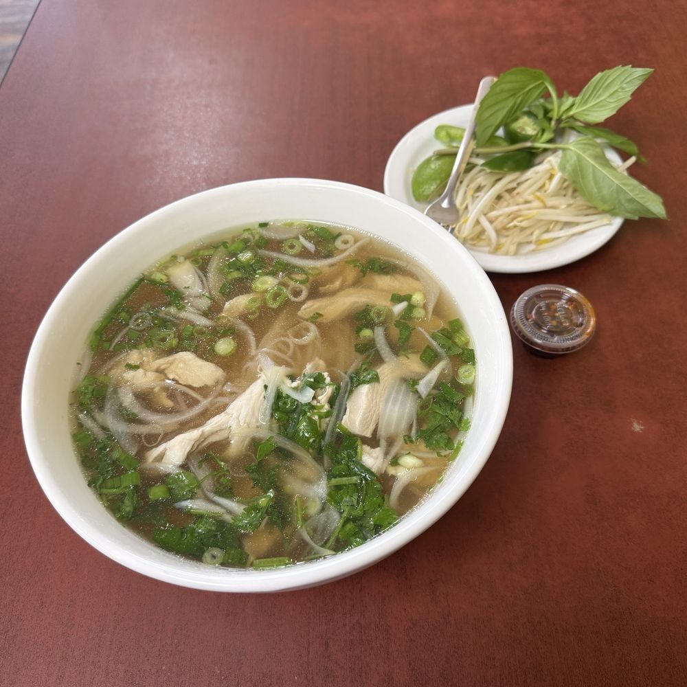 VN Pho - This the large [P10] Chicken Pho with garnish and that little soufflé cup of "FIRE" sauce...beware :-) - Vietnamese Near Me - Wenatchee, Washington