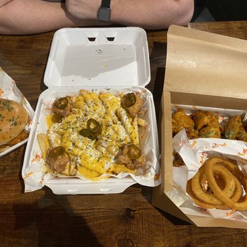 Fowl N Out - Honey cajun chicken sandwich, loaded fries with garlic butter bliss wings, 10pc honey gold party wings, onion rings. Delicious! - Chicken Wings Near Me - Olive Branch, Mississippi Fowl N Out - Honey cajun chicken sandwich, loaded fries with garlic butter bliss wings, 10pc honey gold party wings, onion rings. Delicious! - Chicken Wings Near Me - Olive Branch, Mississippi