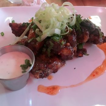 Wet City - Confit Chicken Wings (Thai Chili Garlic) - Beer Bar Near Me - Baltimore, Maryland Wet City - Confit Chicken Wings (Thai Chili Garlic) - Beer Bar Near Me - Baltimore, Maryland