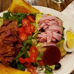 McGuire's Irish Restaurant & Pub - Salad combination of spinach salad & bacon and chef's salad with a warm bacon, sweet & sour dressing.