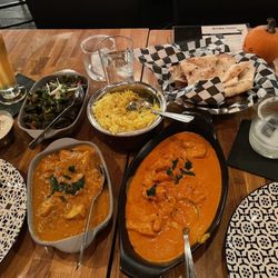 Karma Indian Bistro - Okra, chicken madras, coconut rice, fish Malabari and garlic basil naan. All so good!