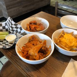 Boulevard Pizza - As you can see, a dozen wings means the whole wing! Think I ordered too much, but they were amazing!