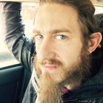 Good Look Barber Shop - He wasn't too excited before he went in to get his beard trimmed. :( - Barbers Near Me - Marietta, Georgia