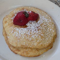 Pancakes with browning strawberry on top