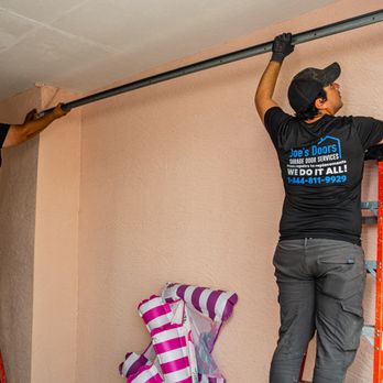 Joes Doors Garage Door Services - Joe's team installing a garage door track - Garage Door Services Near Me - Naples, Florida Joes Doors Garage Door Services - Joe's team installing a garage door track - Garage Door Services Near Me - Naples, Florida