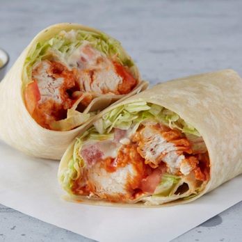 Wings Over - Madison - a wrap of chicken and lettuce - Chicken Wings Near Me - Madison, Wisconsin Wings Over - Madison - a wrap of chicken and lettuce - Chicken Wings Near Me - Madison, Wisconsin