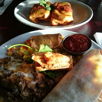 Gina's Mexican Cafe - Acapulco (I believe) 2 small shrimp crispy flautas, chicken taco, corn and frijoles. Rice and cheese chimichangas in background!! Yummo! - Mexican Near Me - Nanaimo, British Columbia