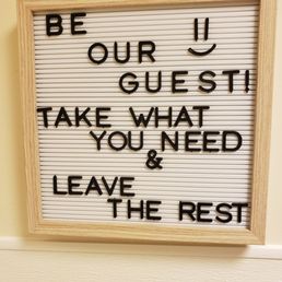 Cute welcoming sign in the gender neutral bathroom Cute welcoming sign in the gender neutral bathroom