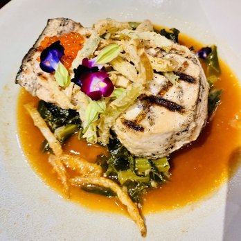 A Land Remembered - Sword fish with collar greens - Steakhouses Near Me - Orlando, Florida