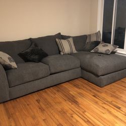 Colfax Furniture & Mattress - The whole couch, with the feet missing under the chaise.