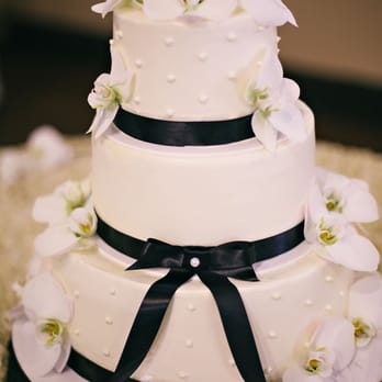 Paris Baguette - Our 3 tier wedding cake (flower decoration done by Gloria Flowers, Downtown Los Angeles). - Bakeries Near Me - Glendale, California