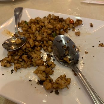 Sichuan House - a plate of food with a spoon on it - Szechuan Near Me - Johns Creek, Georgia