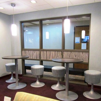 Brieden Orthodontics: Christopher M. Brieden, DDS, MS - High table seating in the waiting area. - Orthodontists Near Me - New Baltimore, Michigan Brieden Orthodontics: Christopher M. Brieden, DDS, MS - High table seating in the waiting area. - Orthodontists Near Me - New Baltimore, Michigan