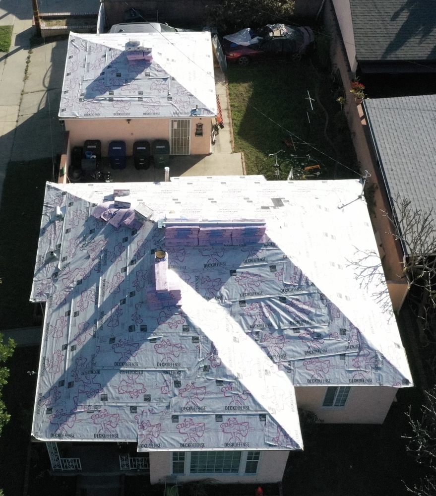 Slide of Trmj Roofing