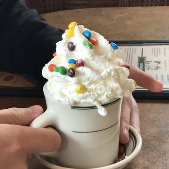 Saw Mill Cafe - Mini m&m hot cocoa with house whipped cream - Cafes Near Me - Mill Creek, Washington