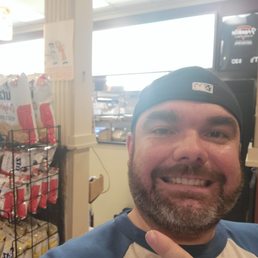 a man making a peace sign