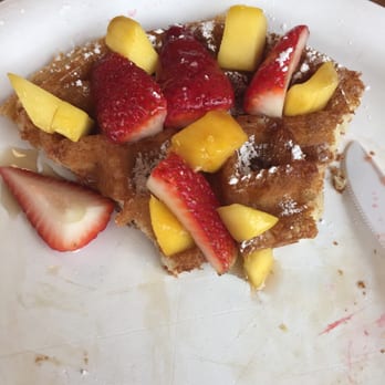 Waffles Cafe - Fluffy waffle with mango, strawberry and powder sugar - Coffee & Tea Near Me - Las Vegas, Nevada Waffles Cafe - Fluffy waffle with mango, strawberry and powder sugar - Coffee & Tea Near Me - Las Vegas, Nevada
