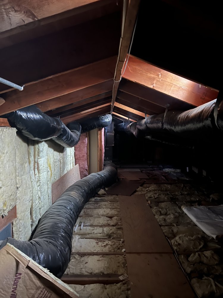 Slide of Everest Roofing