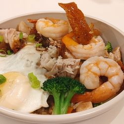 Kitchen Classics - Fried rice bowl, with lechon, tiger prawns, and sunny side up egg..