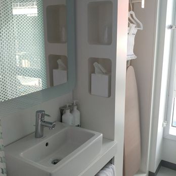 YOTEL Boston - Sink, ironing board, window area. - Hotels Near Me - Boston, Massachusetts YOTEL Boston - Sink, ironing board, window area. - Hotels Near Me - Boston, Massachusetts