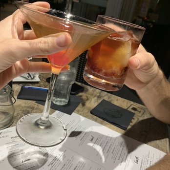 Spritz Stuart - Cheers! Chai Tea Manhattan ($13) & The Woodford ($14.50) - Tapas/Small Plates Near Me - Stuart, Florida Spritz Stuart - Cheers! Chai Tea Manhattan ($13) & The Woodford ($14.50) - Tapas/Small Plates Near Me - Stuart, Florida