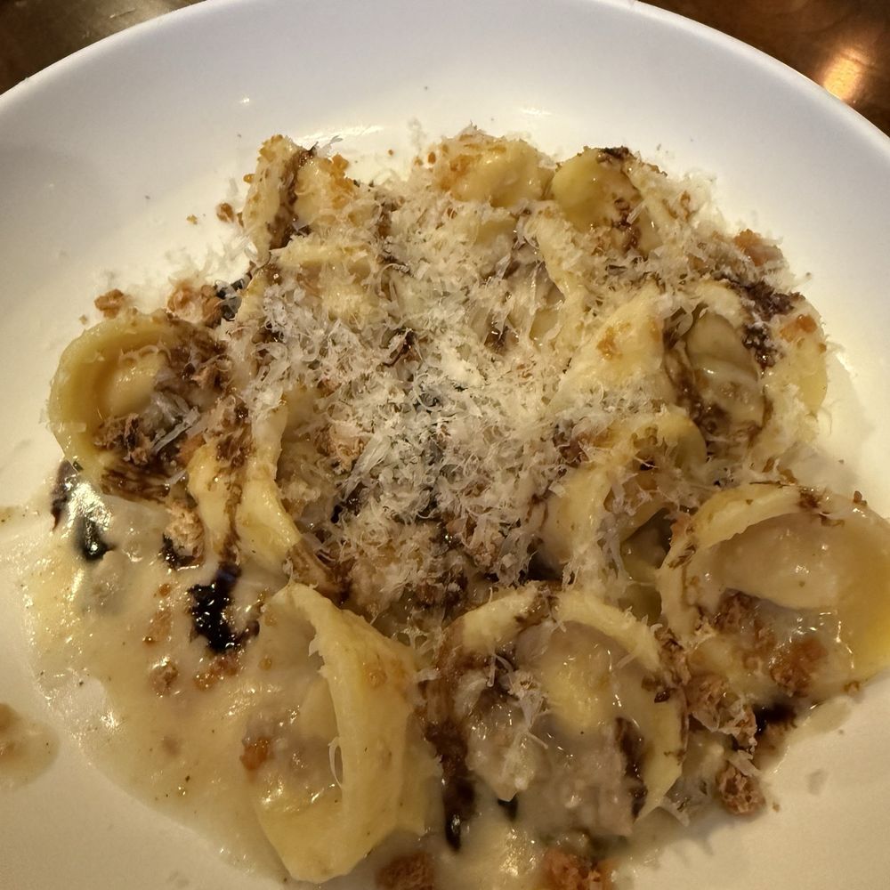 Inizio - butternut cappellacci hat-shaped squash parcels from ferrara, with sausage, sage brown butter & amaretti - Italian Near Me - Buffalo, New York