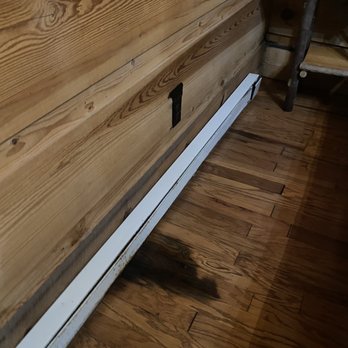 Mountain View Cabin Rentals - Water damage on floor near baseboard heat. - Vacation Rentals Near Me - Tellico Plains, Tennessee Mountain View Cabin Rentals - Water damage on floor near baseboard heat. - Vacation Rentals Near Me - Tellico Plains, Tennessee