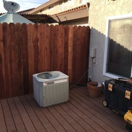 an air conditioner on a deck