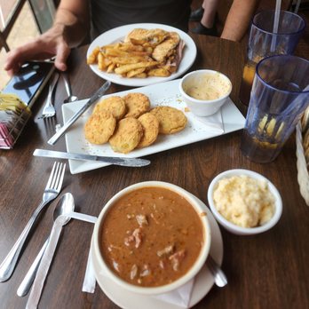 Cafe' la Fleur - Cubano with fries, fried green tomatoes, seafood gumbo and cheesy grits. - Cajun/Creole Near Me - Laurel, Mississippi Cafe' la Fleur - Cubano with fries, fried green tomatoes, seafood gumbo and cheesy grits. - Cajun/Creole Near Me - Laurel, Mississippi