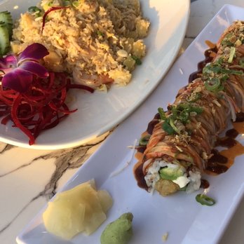 Kin Thai & Sushi - Pineapple Fried rice with shrimp and Firecracker Roll - Thai Near Me - San Antonio, Texas Kin Thai & Sushi - Pineapple Fried rice with shrimp and Firecracker Roll - Thai Near Me - San Antonio, Texas
