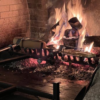 Whistlepig Pavilion - Raclette toasting - Burgers Near Me - Stowe, Vermont Whistlepig Pavilion - Raclette toasting - Burgers Near Me - Stowe, Vermont