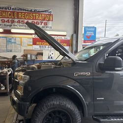 Truck getting smog tested.