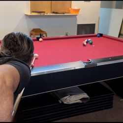 Having fun shooting pool with friends!