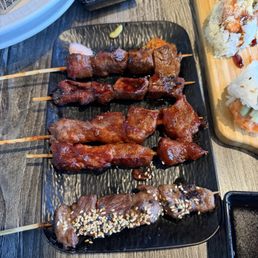 Yakitori from top to bottom- filet mignon, short rib, galbi Yakitori from top to bottom- filet mignon, short rib, galbi