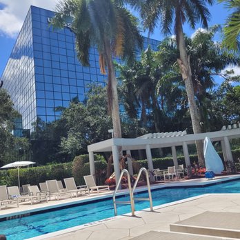 Hilton Suites Boca Raton - Poolside lounging at its finest - Hotels Near Me - Boca Raton, Florida