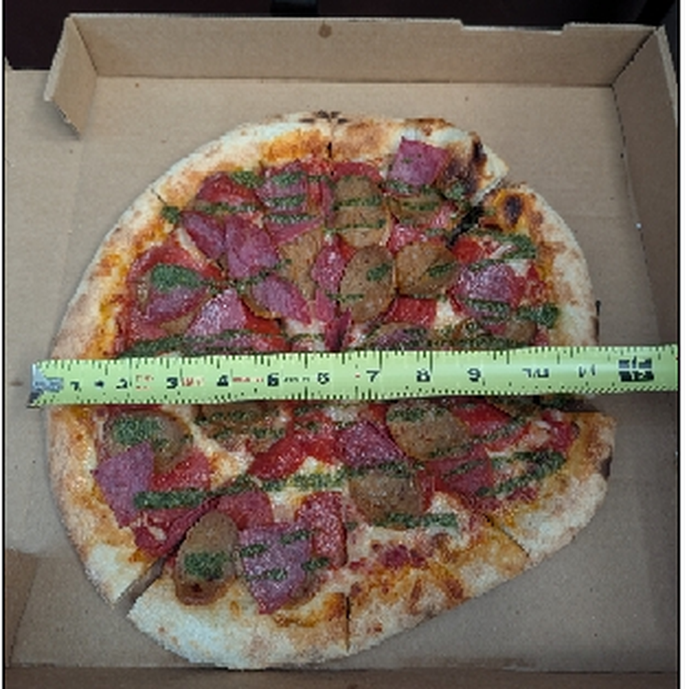 Esta Pizza - Supposedly this is a 14" pizza - Pizza Near Me - Leon Valley, Texas