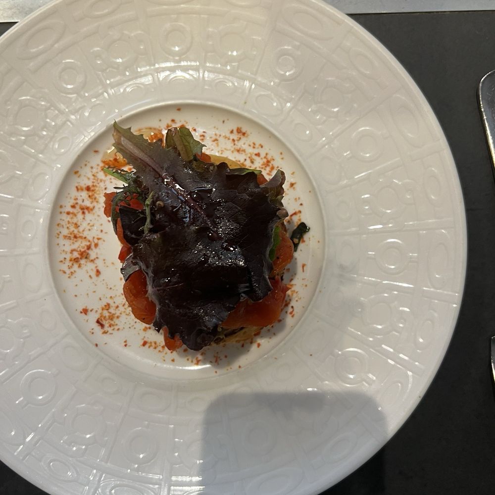 Thin tart with dried tomatoes, smoked eggplant, honey with chive flowers Thin tart with dried tomatoes, smoked eggplant, honey with chive flowers
