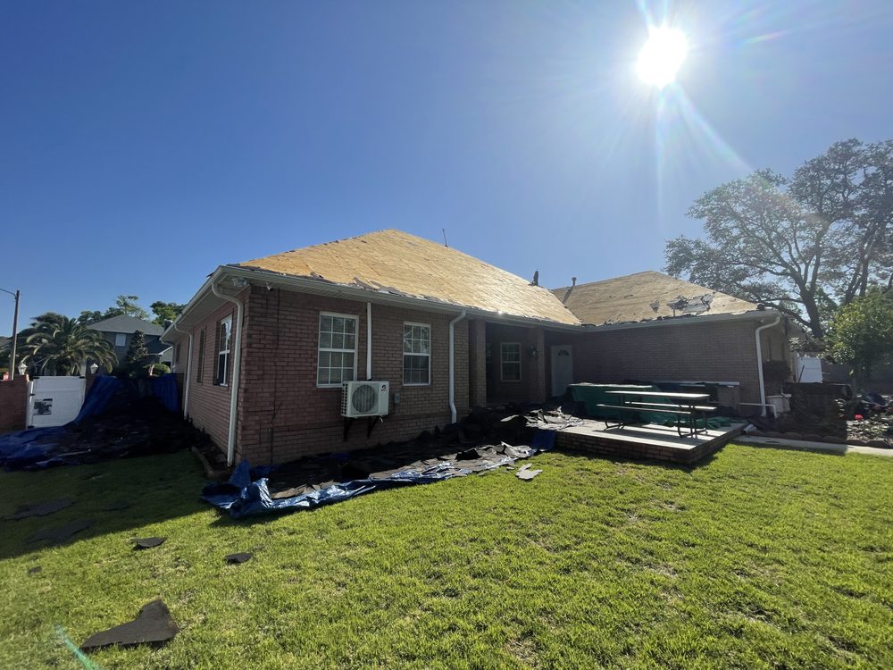 Slide of TNW Roofing