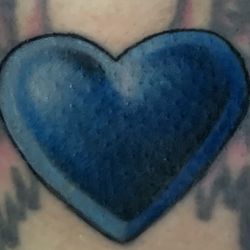 Muse Tattoo Studios - Heart cover-up