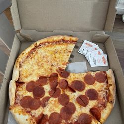 Antonio's Pizza - Pie with packets of grated cheese I was generously given.