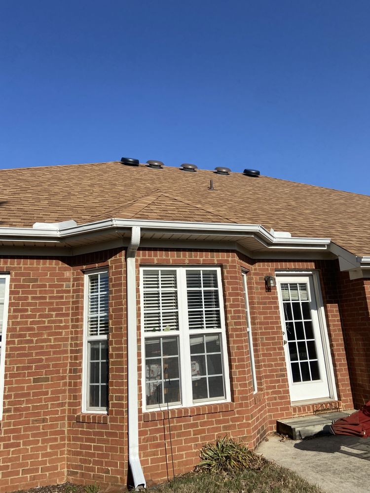 Slide of Wood’s Roofing Solutions