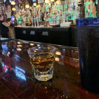 Whistle Post Tavern - a glass of whiskey on the bar - Music Venues Near Me - Conyers, Georgia Whistle Post Tavern - a glass of whiskey on the bar - Music Venues Near Me - Conyers, Georgia
