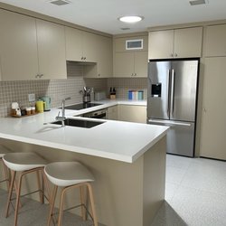 Mcclintock Cabinets - Slab custom kitchen with customer-created color.