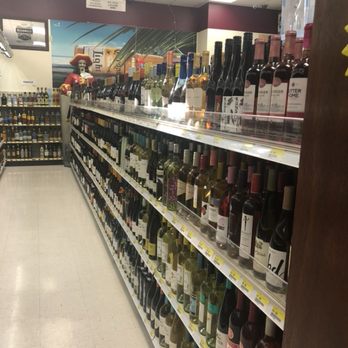 Royal Market - rows of bottles of wine on shelves - Tobacco Shops Near Me - Reno, Nevada Royal Market - rows of bottles of wine on shelves - Tobacco Shops Near Me - Reno, Nevada