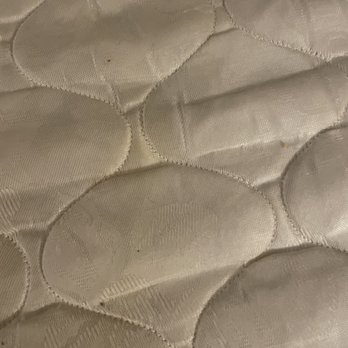 Holiday Inn Express Temecula - Dirt and stains on bed - Hotels Near Me - Temecula, California