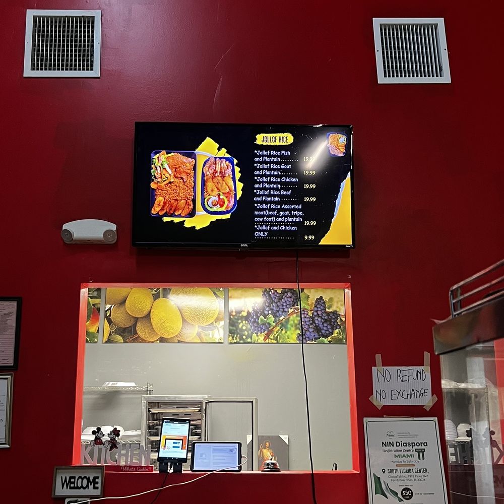 Rejoice - a menu on a red wall - Bars Near Me - Lauderhill, Florida Rejoice - a menu on a red wall - Bars Near Me - Lauderhill, Florida