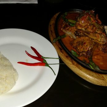 Maple Valley Thai Cuisine - Sticky rice on the left, Choo Chee Ped (crispy duck in Panang curry) on the right. Yum! - Thai Near Me - Maple Valley, Washington Maple Valley Thai Cuisine - Sticky rice on the left, Choo Chee Ped (crispy duck in Panang curry) on the right. Yum! - Thai Near Me - Maple Valley, Washington