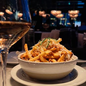 RH Rooftop Restaurant at RH Dallas - Truffle fries and rose - American Near Me - Dallas, Texas RH Rooftop Restaurant at RH Dallas - Truffle fries and rose - American Near Me - Dallas, Texas