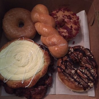 Donut Worry - From left to right: glazed, tiny twist(glazed), maple bacon, cheese Danish, apple fritter, Carmel turtle - Donuts Near Me - Lawrenceville, Georgia